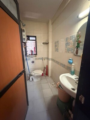 Bathroom in 2 BHK Apartment at Umiya Nagar CHS, Goregaon East – for Rent
