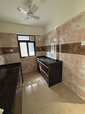 Kitchen in 2 BHK Apartment at Mamta Apartment Andheri, Andheri West – for Rent