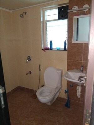 Bathroom in 3 BHK Apartment at Paranjape Schemes Yuthika, Baner – for Rent