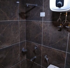Bathroom in 2 BHK Apartment at CGHS HEWO Apartments, Sector 56 – for Rent