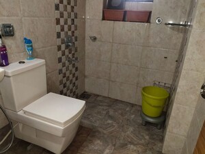 Bathroom in 2 BHK Apartment at Crystal Isle Apartment, Goregaon East – for Rent