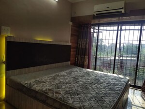 Bedroom in 2 BHK Apartment at Crystal Isle Apartment, Goregaon East – for Rent