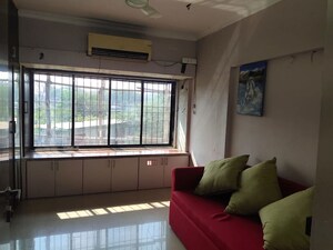 Living Room in 2 BHK Apartment at Crystal Isle Apartment, Goregaon East – for Rent