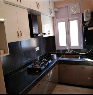 Kitchen in 2 BHK Apartment at CGHS HEWO Apartments, Sector 56 – for Sale