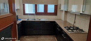 Kitchen in 4 BHK Apartment at Vasant Vihar – for Rent