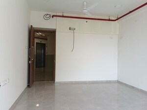 Living Room in 1 BHK Apartment at Ajmera Boulevard, Malad West – for Rent