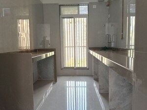 Kitchen in 1 BHK Apartment at Ajmera Boulevard, Malad West – for Rent