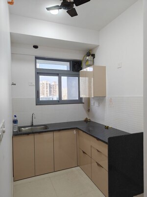 Kitchen in 1.5 BHK Apartment at Kalpataru Elitus, Mulund West – for Rent