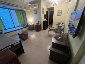 Living Room in 1 BHK Apartment at Shree Vallabh Tower, Malad West – for Rent