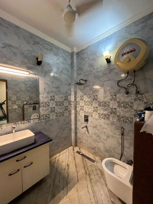 Bathroom in 5 BHK Builder Floor at Green Fields Colony – for Rent