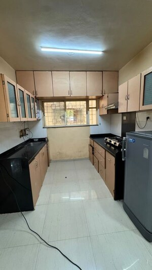 Kitchen in 2 BHK Apartment at SSD Sai Marigold, Pimple Saudagar – for Rent