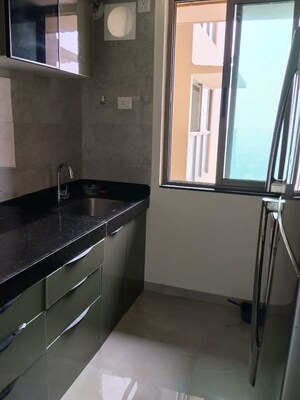 Kitchen in 2 BHK Apartment at Sheth Auris Bliss, Malad West – for Rent