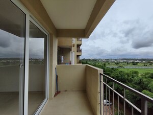 Balcony in 2 BHK Apartment at Bhartiya Nikoo Homes, Thanisandra Main Road – for Rent