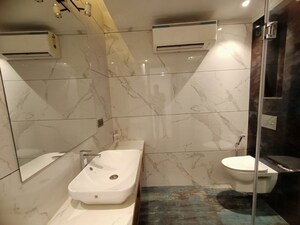 Bathroom in 4 BHK Builder Floor at Sushant Lok ii – for Sale
