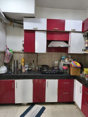 Kitchen in 2 BHK Apartment at Nimbus The Golden Palm, Sector 168 – for Rent