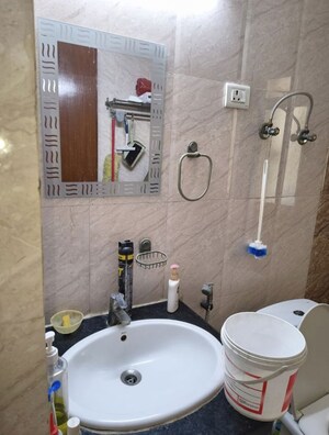 Bathroom in 2 BHK Apartment at Nimbus The Golden Palm, Sector 168 – for Rent