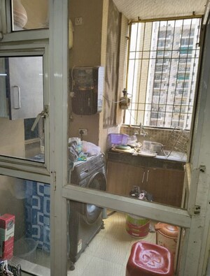 Kitchen in 2 BHK Apartment at Nimbus The Golden Palm, Sector 168 – for Rent