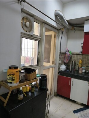 Kitchen in 2 BHK Apartment at Nimbus The Golden Palm, Sector 168 – for Rent