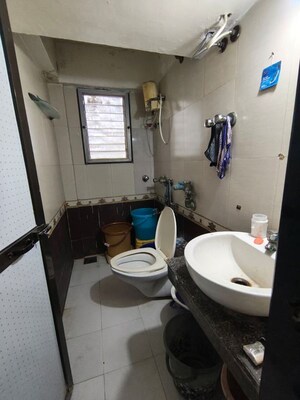 Bathroom in 3 BHK Apartment at Evershine Woods, Mira Road – for Sale