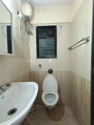 Bathroom in 2 BHK Apartment at Romell Empress, Borivali West – for Rent