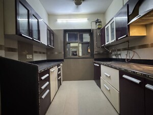 Kitchen in 3 BHK Apartment at Regency Estate, Dombivli East – for Sale