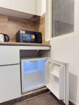 Kitchen in 1 BHK Apartment at Nimbus The Golden Palm, Sector 168 – for Sale