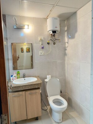 Bathroom in 1 BHK Apartment at Nimbus The Golden Palm, Sector 168 – for Sale