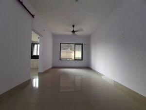 Room in 1 BHK Apartment at Unnat Nagar CHS, Goregaon West – for Rent