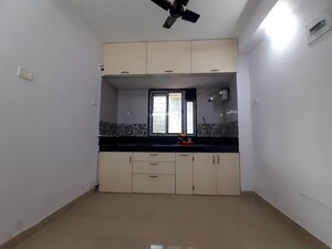 Room in 1 BHK Apartment at Unnat Nagar CHS, Goregaon West – for Rent