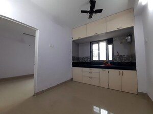 Kitchen in 1 BHK Apartment at Unnat Nagar CHS, Goregaon West – for Rent