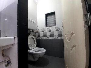 Bathroom in 1 BHK Apartment at Unnat Nagar CHS, Goregaon West – for Rent