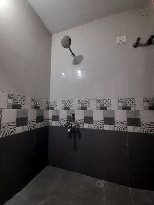 Bathroom in 1 BHK Apartment at Unnat Nagar CHS, Goregaon West – for Rent