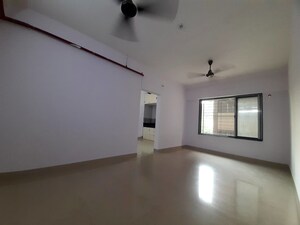 Room in 1 BHK Apartment at Unnat Nagar CHS, Goregaon West – for Rent