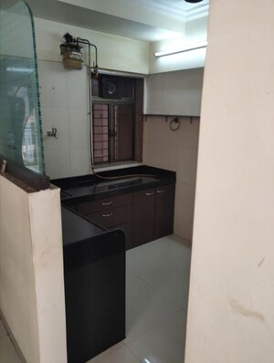 Kitchen in 1 BHK Apartment at Riddhi Garden, Malad East – for Rent