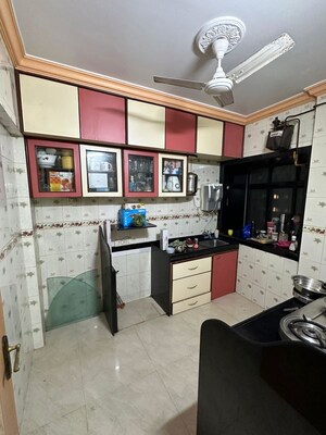 Kitchen in 1 BHK Apartment at Om Shiv Shakti CHS, Gtb Nagar – for Rent