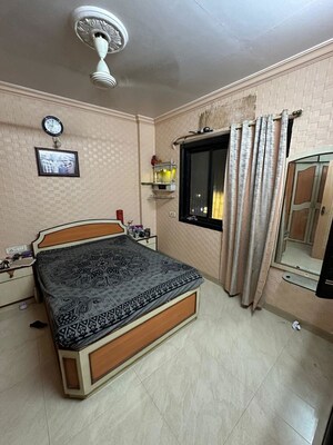 Bedroom in 1 BHK Apartment at Om Shiv Shakti CHS, Gtb Nagar – for Rent