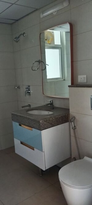 Bathroom in 3.5 BHK Apartment at Godrej Nest, Sector 150 – for Rent