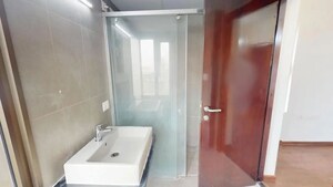 Bathroom in 5 BHK Apartment at Brigade Exotica, Old Madras Road – for Sale