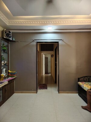 Living Room in 1.5 BHK Apartment at Babhai Naka – for Sale