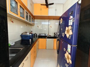 Kitchen in 1.5 BHK Apartment at Babhai Naka – for Sale
