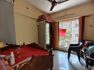 Living Room in 1.5 BHK Apartment at Babhai Naka – for Sale