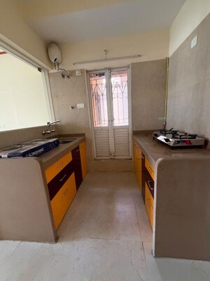 Kitchen in 2 BHK Apartment at Dosti West County, Balkum Pada – for Rent