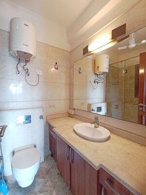 Bathroom in 3 BHK Builder Floor at Greater Kailash – for Rent
