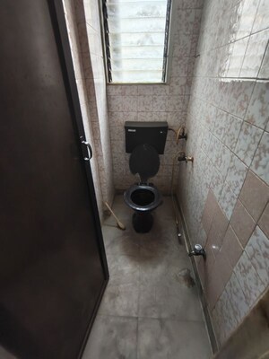 Bathroom in 1 BHK Apartment at Atlanta CHS, Malad West – for Rent