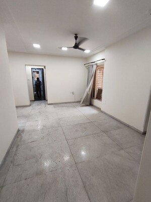 Living Room in 2 BHK Apartment at Kingston Palace, Malad West – for Rent