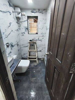 Bathroom in 2 BHK Apartment at Kingston Palace, Malad West – for Rent