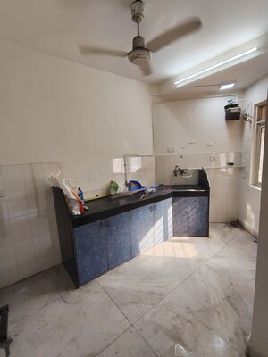 Kitchen in 2 BHK Apartment at Kingston Palace, Malad West – for Rent