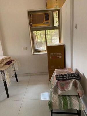 Living Room in 1 BHK Apartment at Worli Sneha CHS, Worli – for Rent