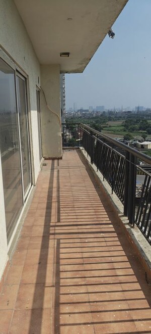 Balcony in 3 BHK Apartment at Antriksh Golf View, Sector 78 – for Rent