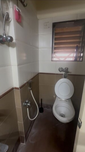 Bathroom in 2 BHK Apartment at Dosti Group Maitri Gardens, Oswal Park – for Rent